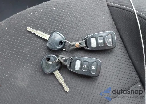 2010 Kia Forte Koup Ex z USA, uszkodzony, nr VIN KNAFU6A26A5270885